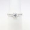 Picture of 14k White Gold & Round Brilliant Cut Diamond Ring with Channel Set Band