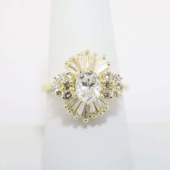 Picture of 18k Yellow Gold & Oval Cut Diamond Ring with Round & Baguette Cut Diamond Halo