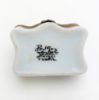 Picture of Vintage Traditional Casket Style Limoges Trinket Box With Flower, Ribbon & Insect Motif.