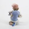 Picture of Lladro Porcelain 1994 Event Figurine 'Little Riders' #7623, Boy with Skateboard Full of Kittens with Box