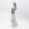 Picture of Lladro #4893 'Walk With The Dog' Woman With Pekingese Figurine