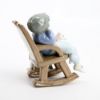 Picture of Lladro #5846 'All Tuckered Out' Boy Sleeping in Rocking Chair with Toy Horse Porcelain Figurine