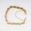 Picture of 18k Yellow Gold Garnet Bracelet