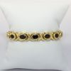 Picture of 18k Yellow Gold Garnet Bracelet