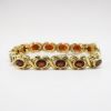 Picture of 18k Yellow Gold Garnet Bracelet