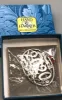Picture of Reed & Barton Sterling Silver 1992 Annual Christmas Cross Ornament, with box