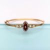 Picture of Victorian Era 15K Gold, Diamond, Natural Seed Pearl & Red Guilloche Enamel Hinged Bangle Bracelet