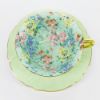 Picture of Vintage Shelley English Bone China 'Melody' Chintz Tea Cup & Saucer in Oleander Shape with Green Exterior