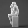 Picture of White Porcelain Seated Nude Female Figurine